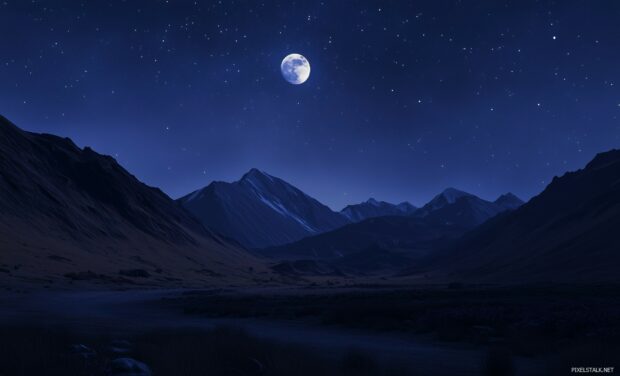 Moon wallpaper with a peaceful mountain landscape illuminated by bright moonlight.