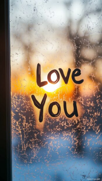 Nature Love iPhone wallpaper with a minimalist design with ove You handwritten on a fogged up window, with soft, natural light streaming through from outside, symbolizing warmth and affection.