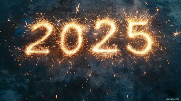 New Year 2025 written with sparkling fireworks trails against a dark night sky.