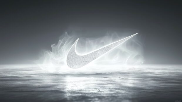 Nike 4K Resolution Background featuring a swoosh logo in a subtle, translucent overlay on a smooth gray texture, providing a refined and understated look.