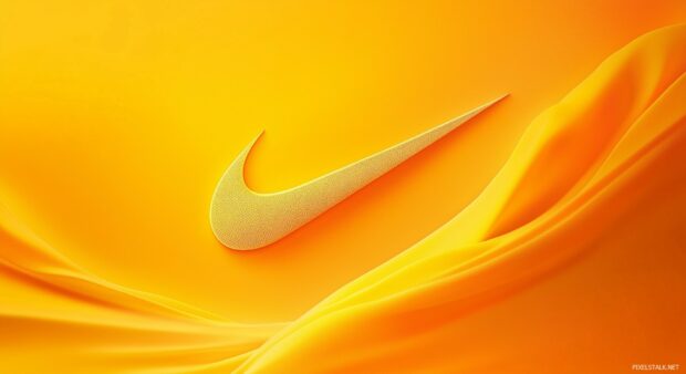 Nike Logo Desktop Wallpaper with a swoosh logo surrounded by dynamic lines and shapes in shades of orange and yellow.