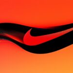 Nike Logo Wallpaper HD featuring the iconic swoosh in a bold, dynamic design with a gradient of red and black.