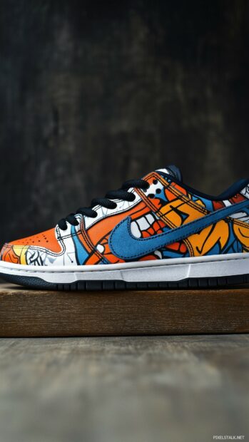 Nike SB Dunk shoes with a colorful graffiti design.