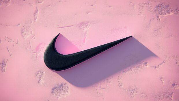 Nike logo 4K in black on a soft pastel pink background.