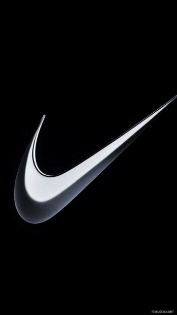 Nike logo in a minimalist design with a slight 3D effect on a deep black background.