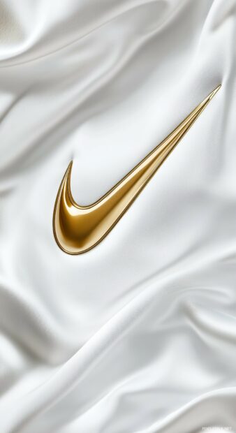 Nike logo in gold on a clean white background, giving a touch of sophistication.