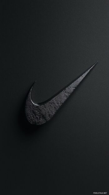 Nike logo with a slight shadow effect on a matte black background.