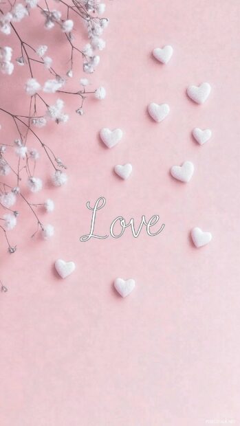 Pink love wallpaper iPhone with the word Love surrounded by small hearts and flowers, set against a soft pastel background.