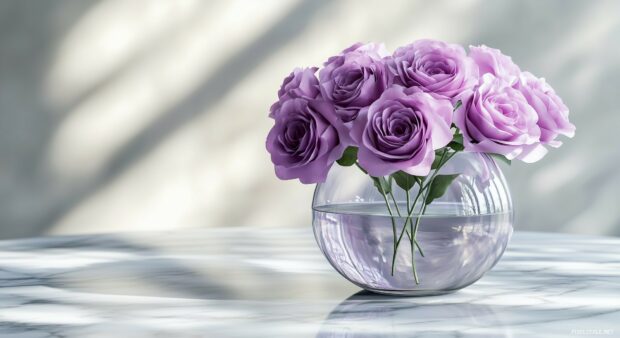 Purple roses in an elegant glass vase, placed on a marble surface, with soft light reflecting off the glass.