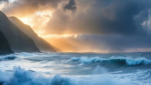 Rocky coastline wallpaper 1920x1080 HD with crashing waves, dramatic clouds, golden hour light.