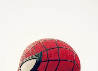 Side profile of Spiderman face with a plain white background.