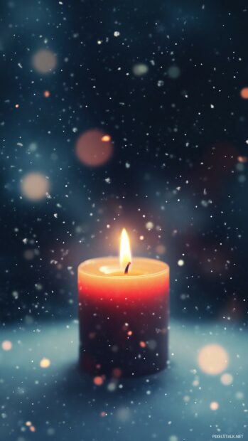 Simple Christmas wallpaper with a soft glowing candle with a gentle flame, surrounded by faint snowflakes (2).