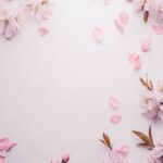 Spring Flowers Desktop Wallpaper HD with a flat lay of colorful spring blossoms on a white background.