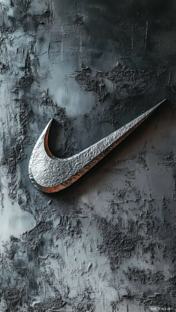 Stylish Nike 3D wallpaper with a large metallic silver swoosh on a textured dark gray background.