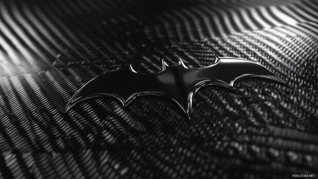 The Batman logo rendered in a chrome finish, centered on a sleek, Black Wallpaper 1920×1080.