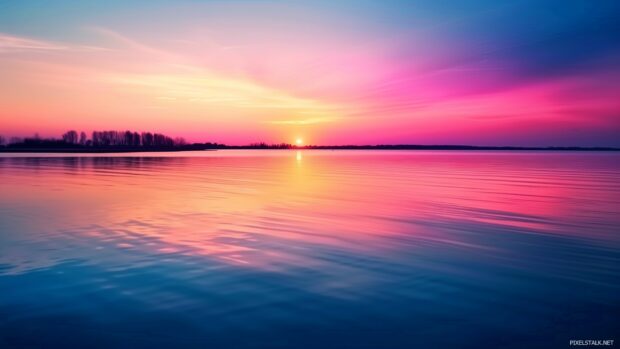 Tranquil lake with colorful reflections and a peaceful atmosphere, Pink Sunset HD Wallpaper.