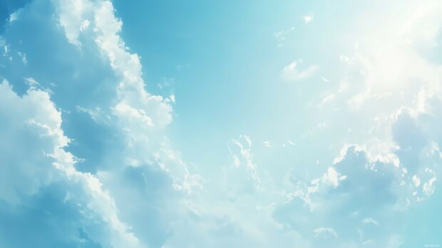 Wallpaper for Windows 10 with gentle, abstract cloud formations in soft white on a light sky blue background.