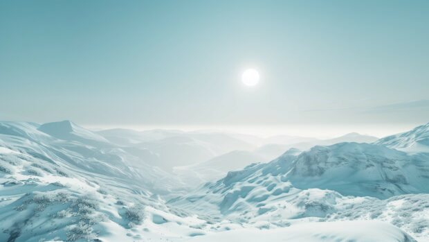 Winter 4K scene wallpaper wonderland with snow covered mountains and a clear blue sky.